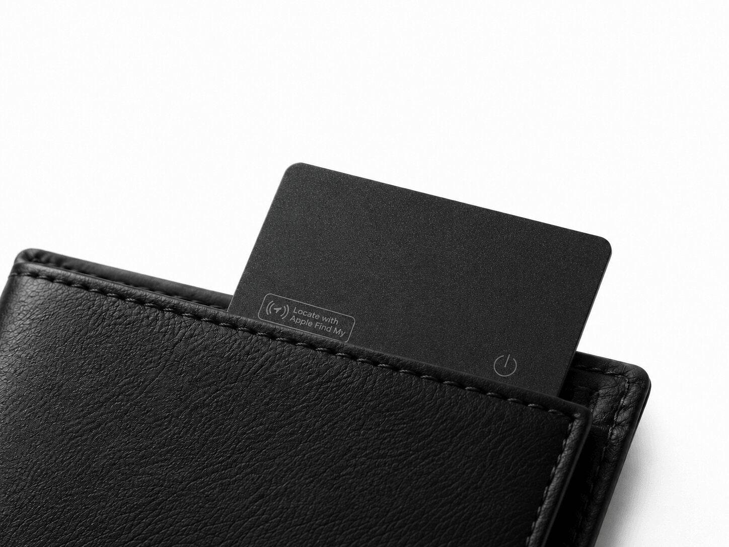 Locsure Tracking Card sliding into a black leather wallet